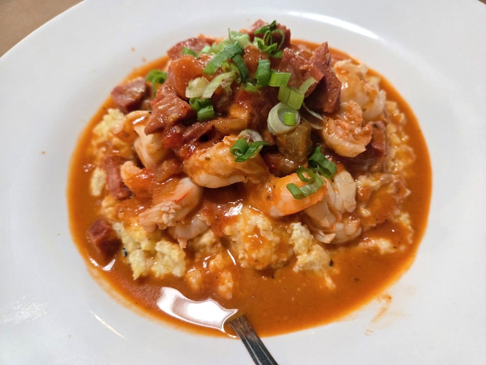Shrimp and grits with andouille and tomato gravy at The Glass Onion.