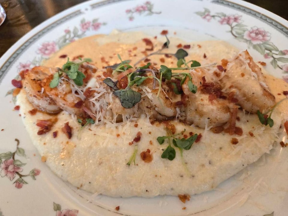 Shrimp and grits with bacon and microgreens at Sunday Sunday.